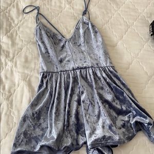 blue believer romper